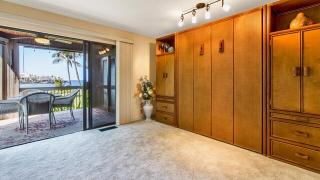 78-261 Manukai St Unit 3501, Kailua-Kona, HI 96740 - entrance foyer featuring carpet floors and a water view