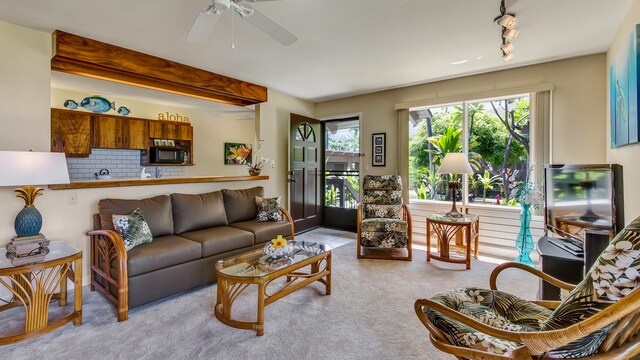 78-261 Manukai St Unit 3501, Kailua-Kona, HI 96740 - carpeted living room with a ceiling fan and rail lighting