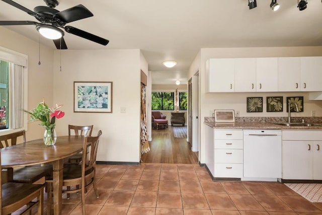 4800 Hanalei Plantation Rd Unit 9B, Princeville, HI 96722 - kitchen with dishwasher, a sink, light tile patterned flooring, ceiling fan, and baseboards