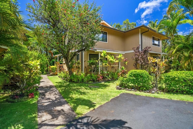 4800 Hanalei Plantation Rd Unit 9B, Princeville, HI 96722 - view of front of home with a front lawn