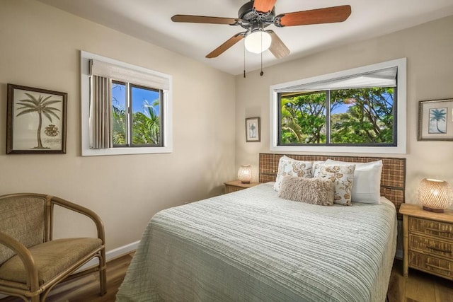 4800 Hanalei Plantation Rd Unit 9B, Princeville, HI 96722 - bedroom featuring wood finished floors, baseboards, and ceiling fan