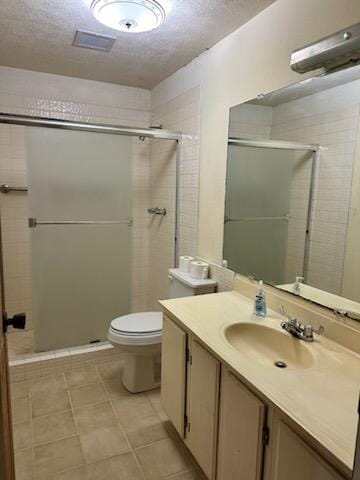 74-5087 Kumakani St, Kailua-Kona, HI 96740 - bathroom with toilet, vanity, a stall shower, and a textured ceiling