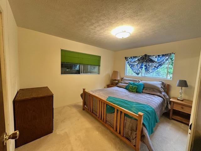 74-5087 Kumakani St, Kailua-Kona, HI 96740 - bedroom featuring light carpet and a textured ceiling