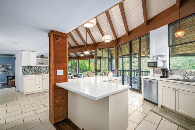 3920 Wyllie Rd Unit 7B, Princeville, HI 96722 - kitchen featuring dishwasher, open shelves, a sink, tasteful backsplash, and white microwave