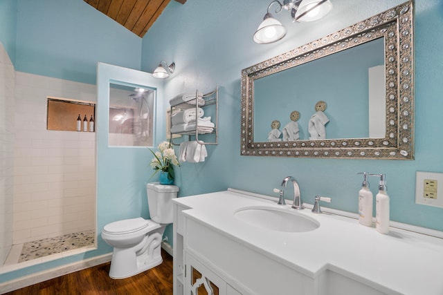 3920 Wyllie Rd Unit 7B, Princeville, HI 96722 - full bath with toilet, a tile shower, vanity, wood finished floors, and vaulted ceiling
