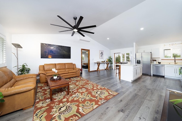 15-2063 18th Ave, Keaau, HI 96749 - living room featuring lofted ceiling, a ceiling fan, dark wood finished floors, recessed lighting, and an AC wall unit