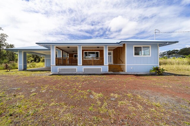 18-4259 Pszyk Rd, Mountain View, HI 96771 - manufactured / mobile home featuring a porch and metal roof
