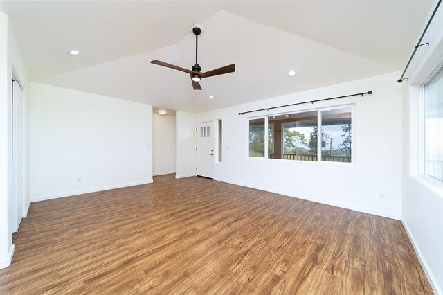 18-4259 Pszyk Rd, Mountain View, HI 96771 - spare room featuring ceiling fan, wood finished floors, recessed lighting, baseboards, and high vaulted ceiling