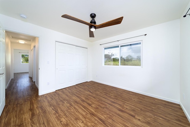 18-4259 Pszyk Rd, Mountain View, HI 96771 - unfurnished bedroom with dark wood finished floors, baseboards, a closet, and ceiling fan