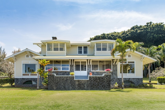 39-3383 Old Mamalahoa Hwy, Ookala, HI 96774 - view of front of home featuring ceiling fan, stone siding, and a front lawn
