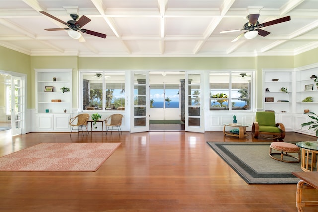39-3383 Old Mamalahoa Hwy, Ookala, HI 96774 - living area featuring coffered ceiling, french doors, ceiling fan, wood finished floors, and built in features