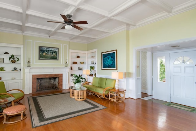 39-3383 Old Mamalahoa Hwy, Ookala, HI 96774 - living area with wood finished floors, ceiling fan, coffered ceiling, built in features, and beamed ceiling
