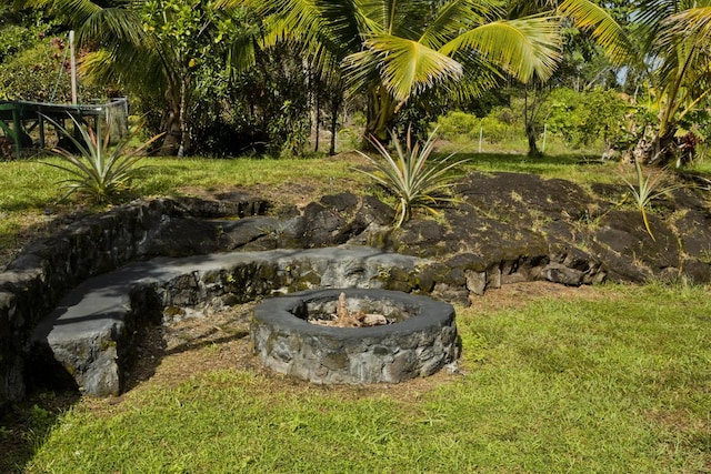 15-1697 7th Ave, Keaau, HI 96749 - view of grassy yard with a fire pit