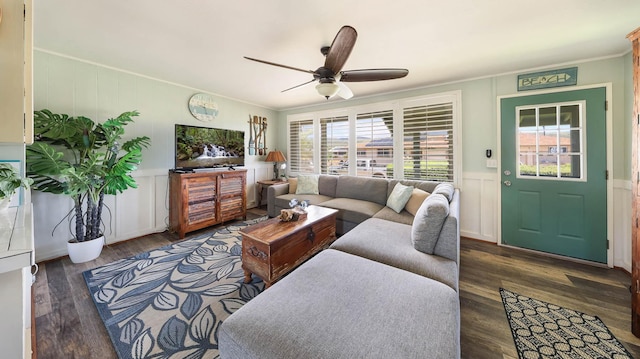 7990 Ulili Rd Unit A, Kekaha, HI 96752 - living area featuring crown molding, a decorative wall, a ceiling fan, wood finished floors, and a wainscoted wall