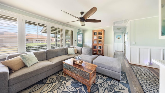 7990 Ulili Rd Unit A, Kekaha, HI 96752 - living room with wood finished floors, a ceiling fan, and a wainscoted wall