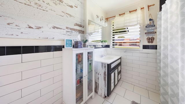 7990 Ulili Rd Unit A, Kekaha, HI 96752 - bathroom with tile walls, vanity, tile patterned flooring, and curtained shower