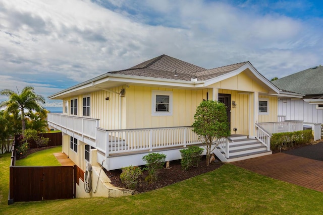 1187 Nohea St, Kalaheo, HI 96741 - view of front of house with roof with shingles and board and batten siding