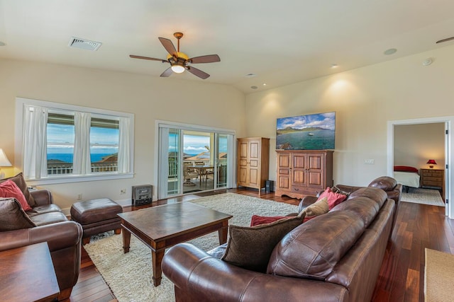 1187 Nohea St, Kalaheo, HI 96741 - living room with dark wood-style floors, ceiling fan, plenty of natural light, and lofted ceiling