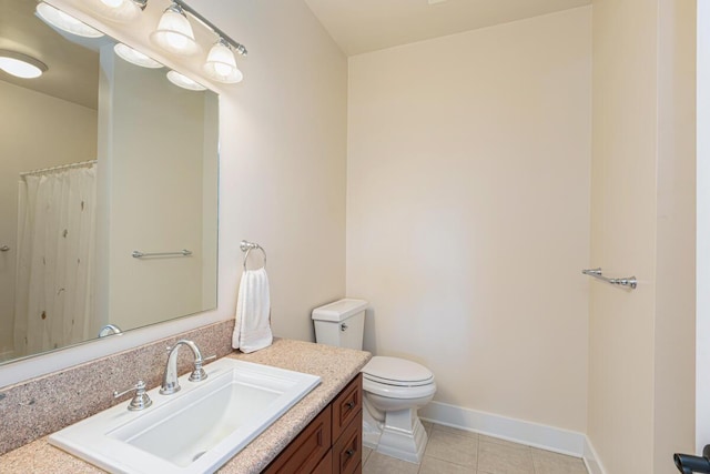 1187 Nohea St, Kalaheo, HI 96741 - full bathroom featuring vanity, toilet, tile patterned flooring, and baseboards