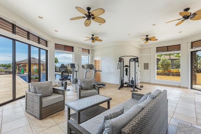 1187 Nohea St, Kalaheo, HI 96741 - workout room featuring ceiling fan, light tile patterned floors, recessed lighting, and baseboards