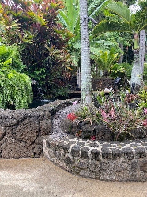 5061 Lawai Rd Unit 203, Koloa, HI 96756 - exterior view of a garden pond