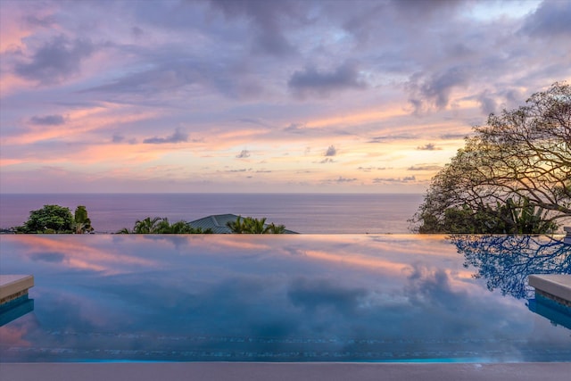 76-981 Aeo St, Kailua-Kona, HI 96740 - pool at dusk with a water view