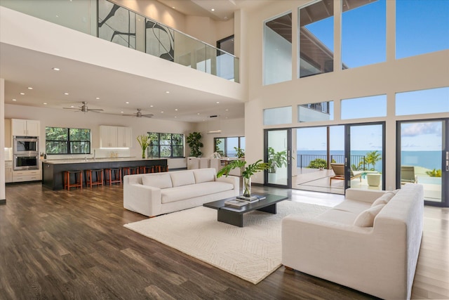 76-981 Aeo St, Kailua-Kona, HI 96740 - living area featuring dark wood-style floors, a high ceiling, a ceiling fan, and recessed lighting
