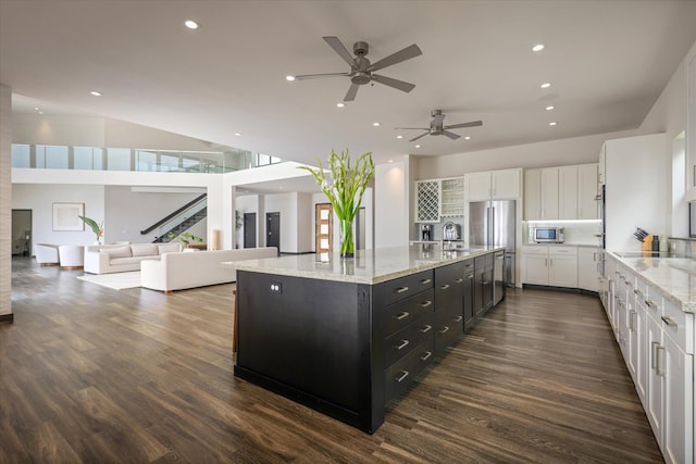 76-981 Aeo St, Kailua-Kona, HI 96740 - kitchen featuring white cabinetry, appliances with stainless steel finishes, dark cabinetry, a spacious island, and recessed lighting