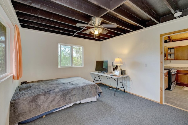 16-2159 Bamboo Dr, Pahoa, HI 96778 - carpeted bedroom featuring a ceiling fan, an office area, and baseboards