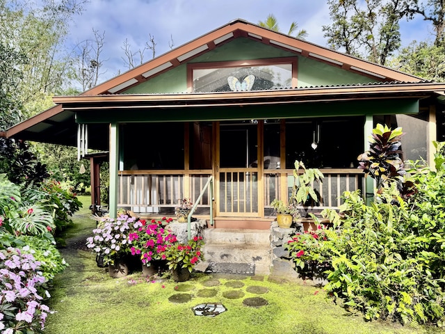 13-1382 Pueo St, Pahoa, HI 96778 - rear view of house with a porch