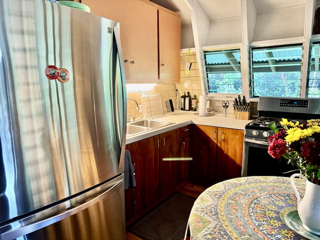 13-1382 Pueo St, Pahoa, HI 96778 - kitchen with stainless steel appliances, a sink, tasteful backsplash, and light countertops
