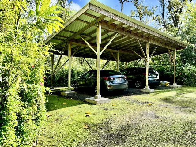 13-1382 Pueo St, Pahoa, HI 96778 - view of parking / parking lot featuring a carport
