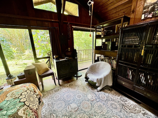 13-1382 Pueo St, Pahoa, HI 96778 - bedroom with vaulted ceiling, access to outside, wooden walls, wood finished floors, and wooden ceiling