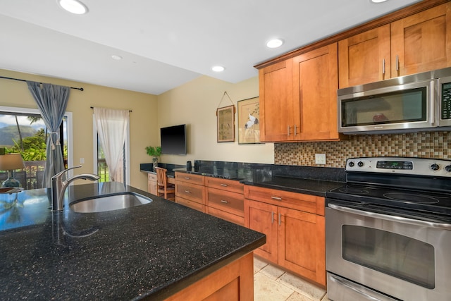 2370 Hoohu Rd Unit 712, Koloa, HI 96756 - kitchen with appliances with stainless steel finishes, a sink, backsplash, brown cabinetry, and recessed lighting