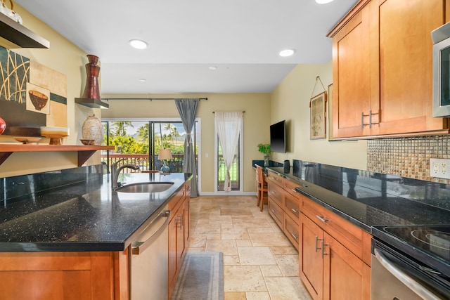 2370 Hoohu Rd Unit 712, Koloa, HI 96756 - kitchen with stainless steel appliances, stone tile floors, tasteful backsplash, a sink, and recessed lighting