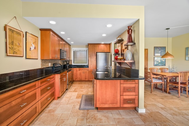 2370 Hoohu Rd Unit 712, Koloa, HI 96756 - kitchen featuring stainless steel appliances, stone tile floors, decorative backsplash, a sink, and recessed lighting