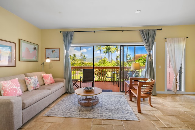 2370 Hoohu Rd Unit 712, Koloa, HI 96756 - living room with stone tile floors and baseboards