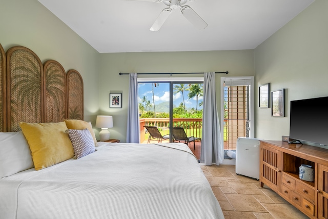 2370 Hoohu Rd Unit 712, Koloa, HI 96756 - bedroom featuring access to exterior, stone tile flooring, and a ceiling fan