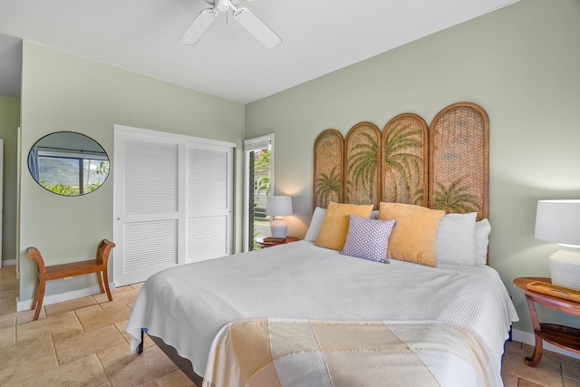 2370 Hoohu Rd Unit 712, Koloa, HI 96756 - bedroom with a closet, baseboards, and a ceiling fan