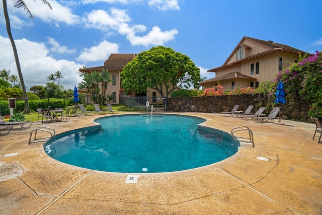 2370 Hoohu Rd Unit 712, Koloa, HI 96756 - community pool featuring a patio area