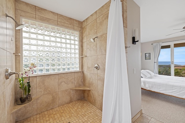 1165 Milia St, Kalaheo, HI 96741 - ensuite bathroom featuring a tile shower, a ceiling fan, and tile patterned floors