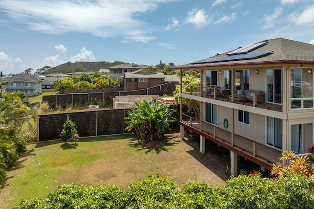1165 Milia St, Kalaheo, HI 96741 - view of green lawn with a residential view and a balcony