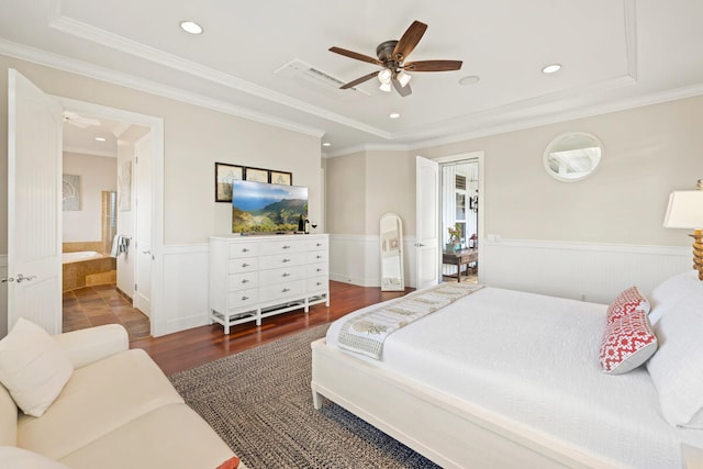 3042 Lauae Pl, Koloa, HI 96756 - bedroom featuring a tray ceiling, wainscoting, wood finished floors, recessed lighting, and crown molding