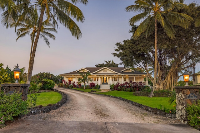 3042 Lauae Pl, Koloa, HI 96756 - view of front of property featuring a lawn and dirt driveway