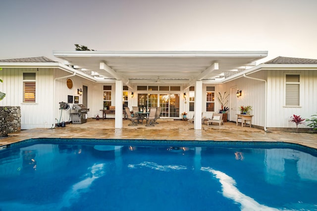 3042 Lauae Pl, Koloa, HI 96756 - swimming pool with grilling area, a patio, a ceiling fan, and outdoor dining area
