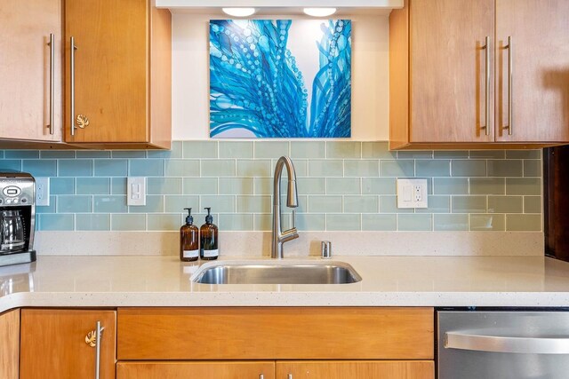 3880 Wyllie Rd Unit 12B, Princeville, HI 96722 - kitchen featuring a sink, dishwasher, light stone counters, and decorative backsplash