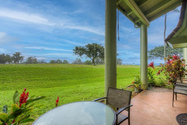 3880 Wyllie Rd Unit 12B, Princeville, HI 96722 - view of patio / terrace featuring a view of countryside and outdoor dining area