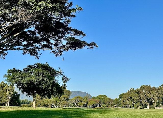 3880 Wyllie Rd Unit 12B, Princeville, HI 96722 - view of property's community featuring a yard and a mountain view