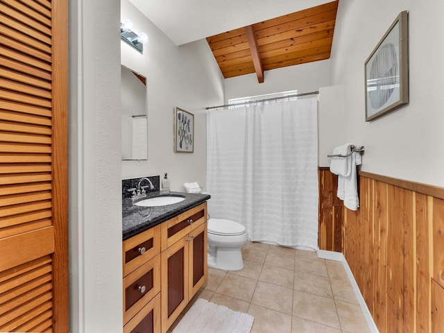 15-1545 27th Ave, Keaau, HI 96749 - full bathroom with wood ceiling with exposed beams, toilet, vanity, a wainscoted wall, and tile patterned flooring