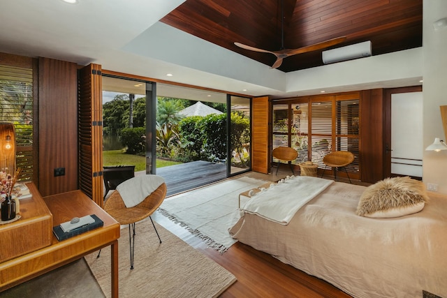 5-1105 Kuhio Hwy Unit A, Kilauea, HI 96754 - bedroom featuring access to outside, recessed lighting, wood finished floors, and a raised ceiling
